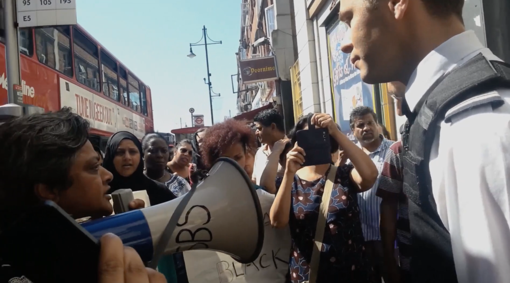 Still from the film Everyday Borders depicting a protest organised by women from the Southall Black Sisters. Everyday Borders was directed by Orson Nava and was produced as part of the EUBorderscapes project.